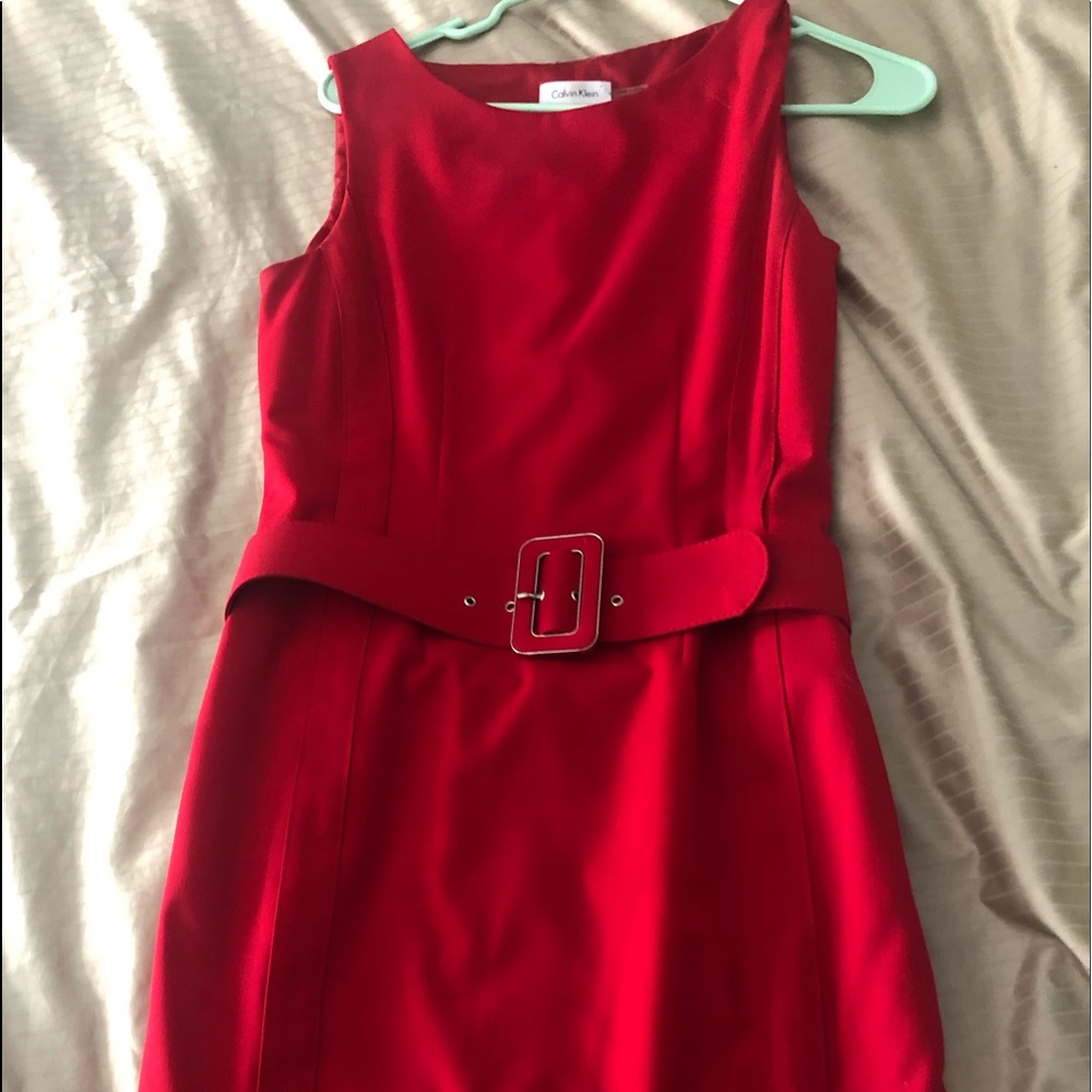 Calvin Klein,size 4, red dress with belt.